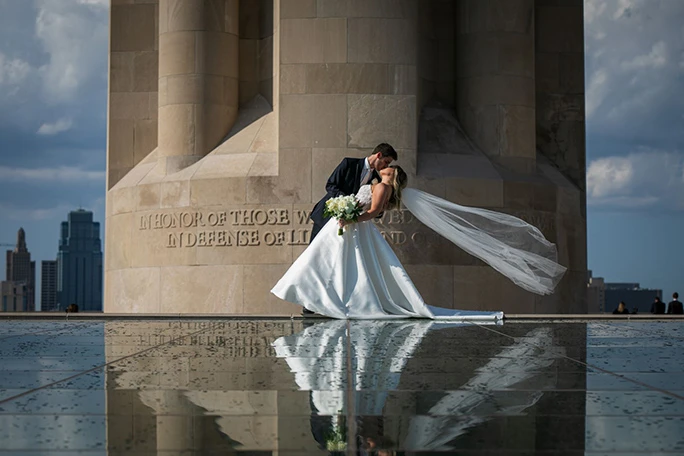 man dips wife and kisses her at kansas city liberty memorial