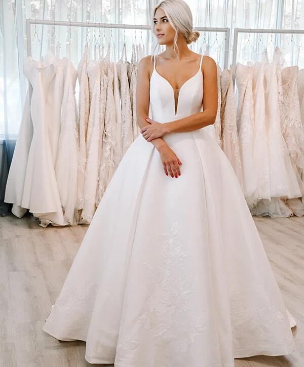 Bridal stylist modeling a wedding dress from private label Oxford Street, style PA1111