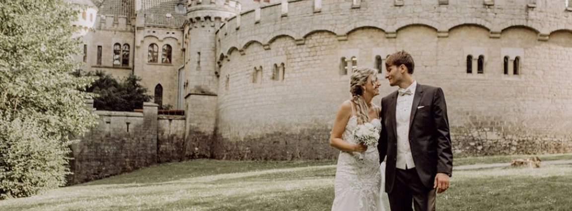 True Bride Alison posing in front of a German Castle