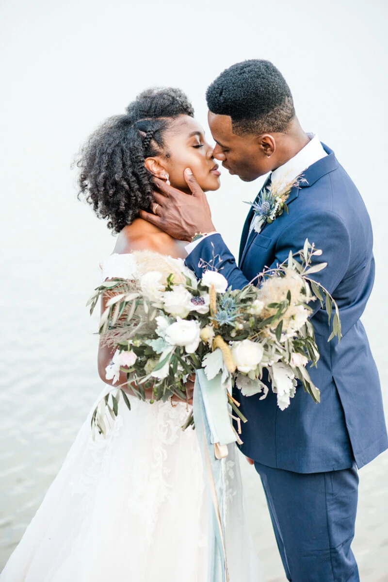 Trendy bride styled photo featuring groom and bride wearing essense of australia dress in style Style D2815