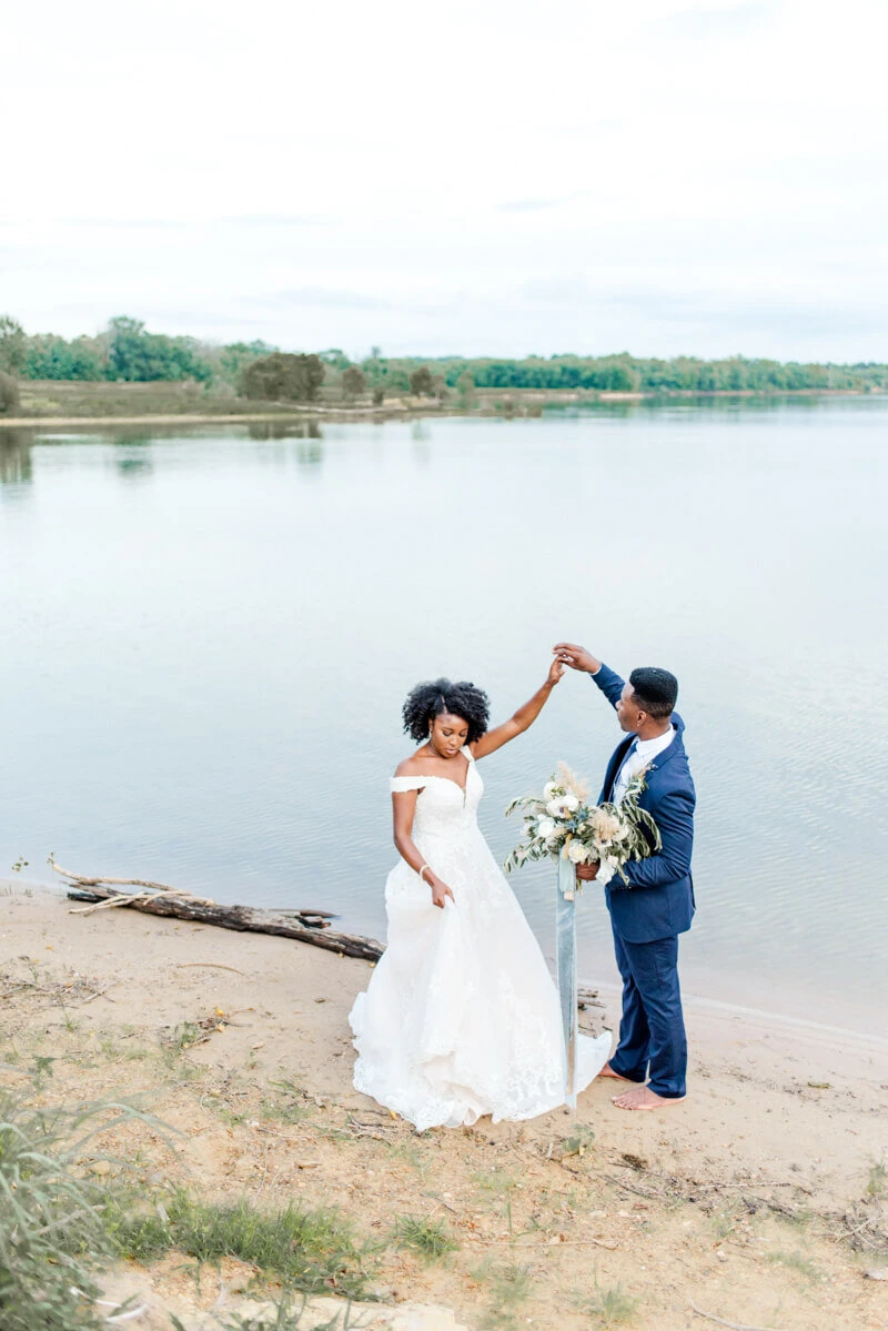 Trendy bride styled photo featuring groom and bride dancing