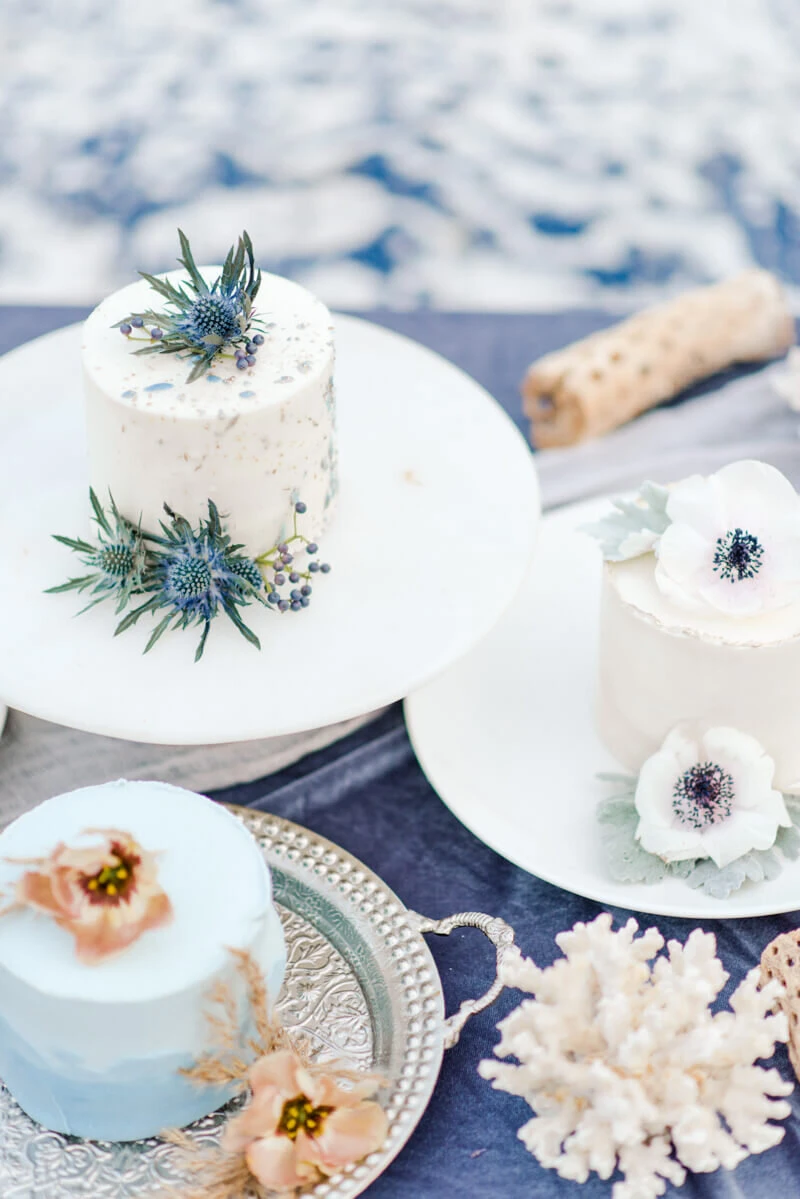 Trendy bride styled photo of wedding cakes on a table