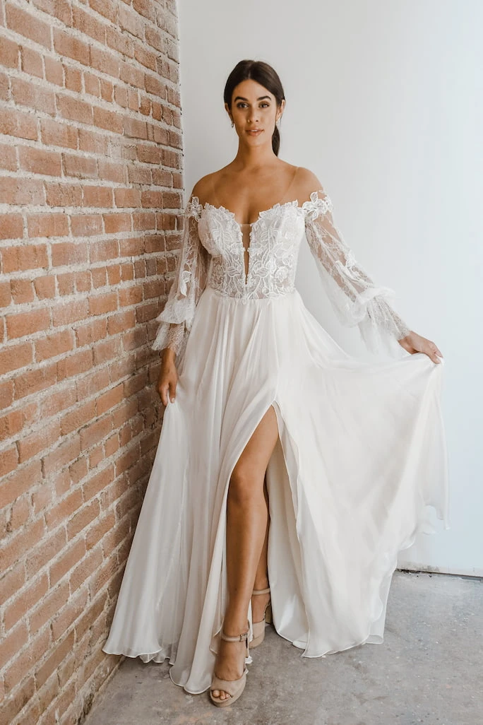 model wearing wedding dress All Who Wander Finn Gown