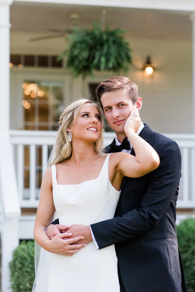 Real Martina Liana Bride and Groom posing for wedding photos