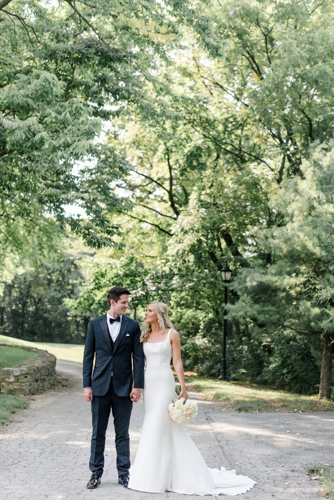 Real Martina Liana Bride and Groom posing for wedding photos