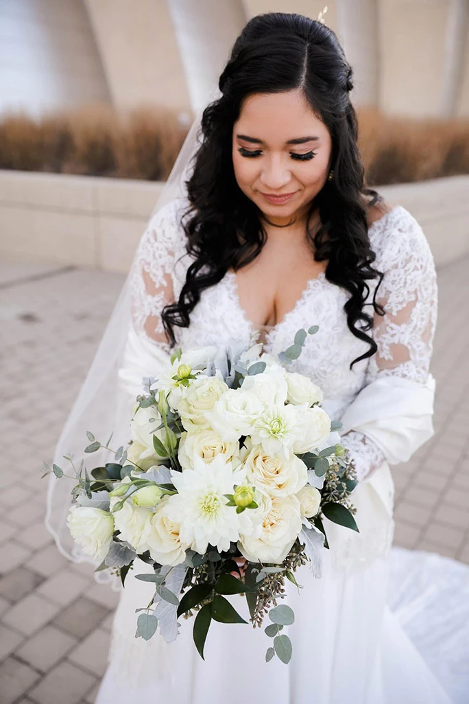 true bride julia wearing oxford street wedding gown and flower bouquet