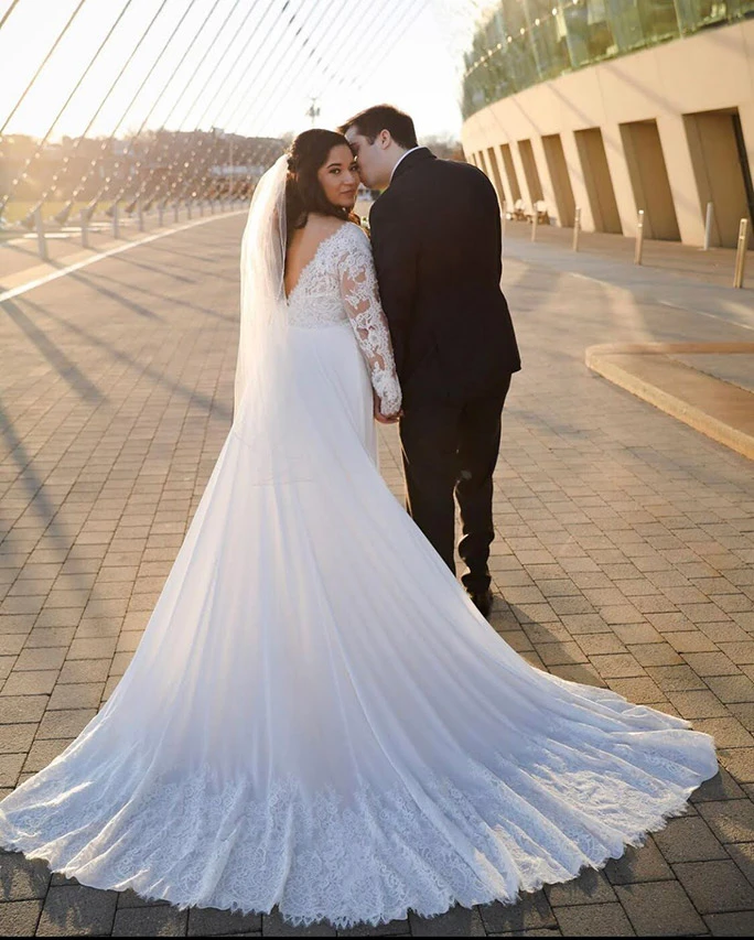 Train shot of True Bride Julia wearing wearing her lace wedding dress by Oxford Street, style PA1125