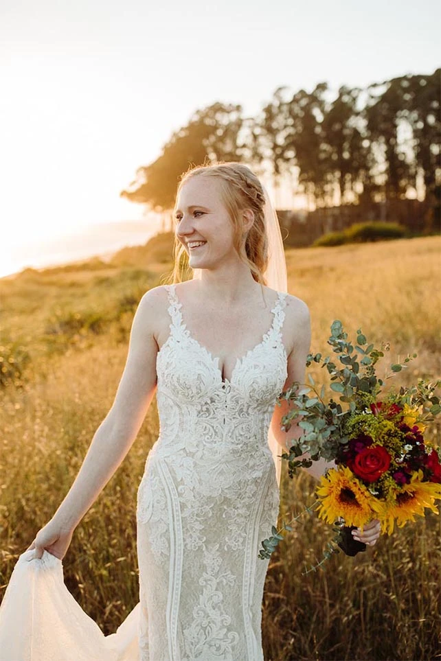 true bride harley holding floral bouquet- style 905 by martina liana