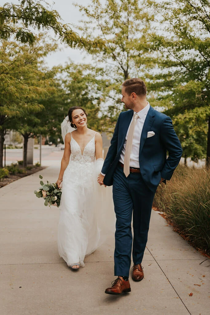 real bride katie and husband walking - style D2840 by essense of australia