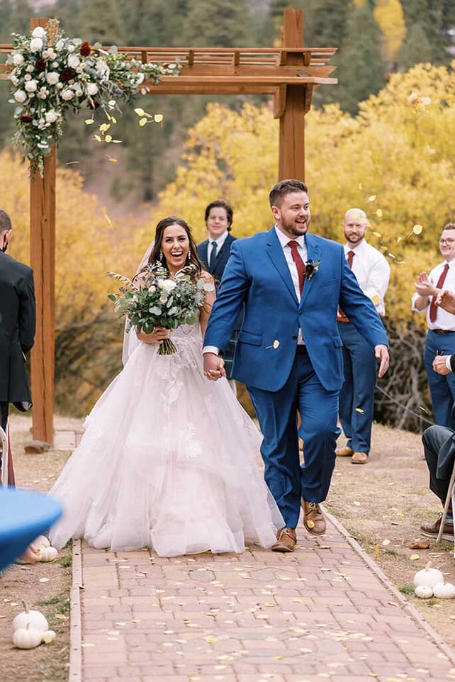 essense bride with groom at wedding venue