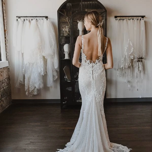 This bride to be is looking at our assortment of Accessories to compliment her dress at True Society by Belle Vogue Bridal Crossroads