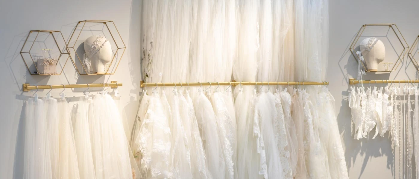 Wall of veils and headpieces to accompany your wedding dress, all available for you to try on at during your bridal appointment at True Society - Grand Rapids.
