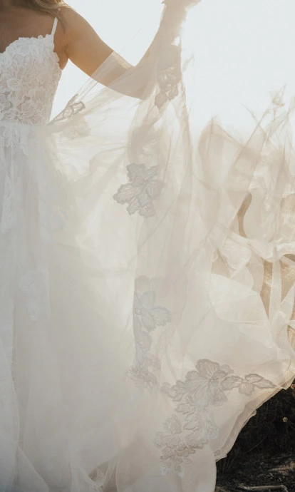 Lace wedding dress and tulle skirt at True Society