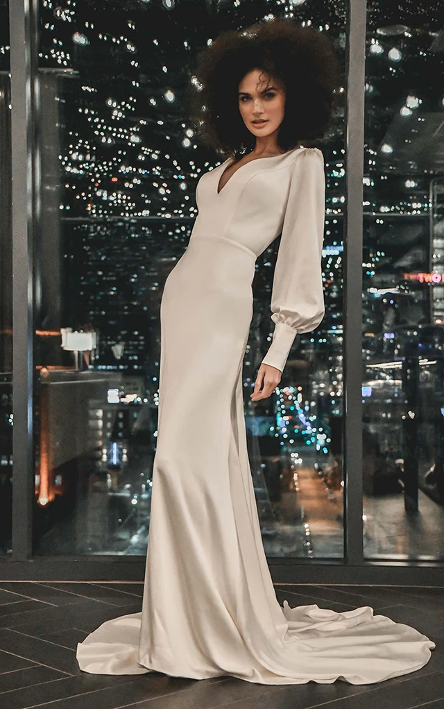 model standing in front of window at night wearing martina liana luxe gown LE1155