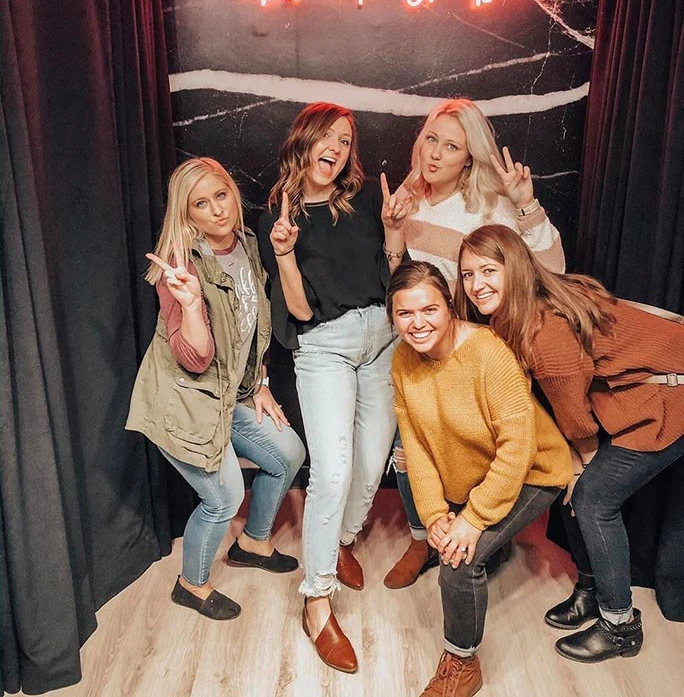 True bride and her bridesmaids shopping for dresses.