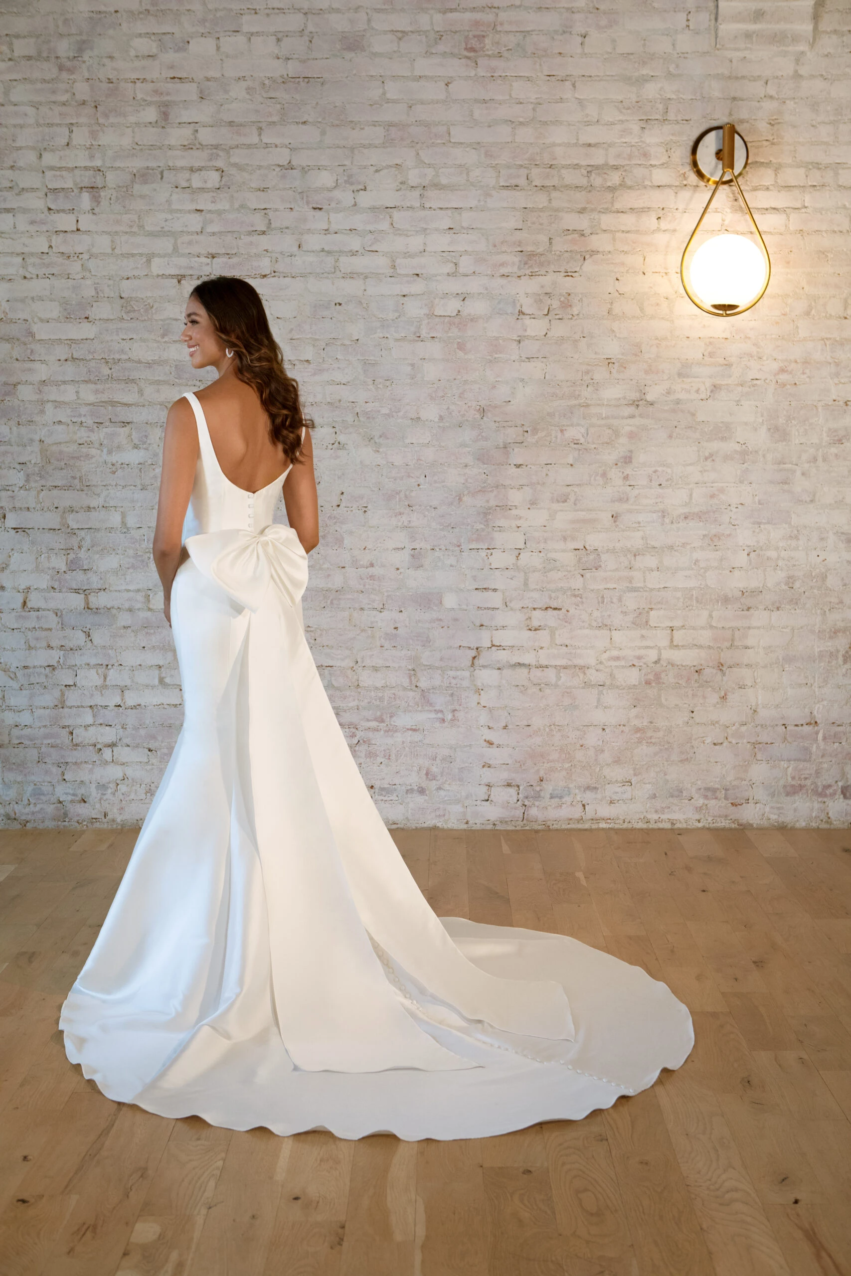 simple fit-anf-flare wedding dress with low back and detachable bow - 7557 by Stella York