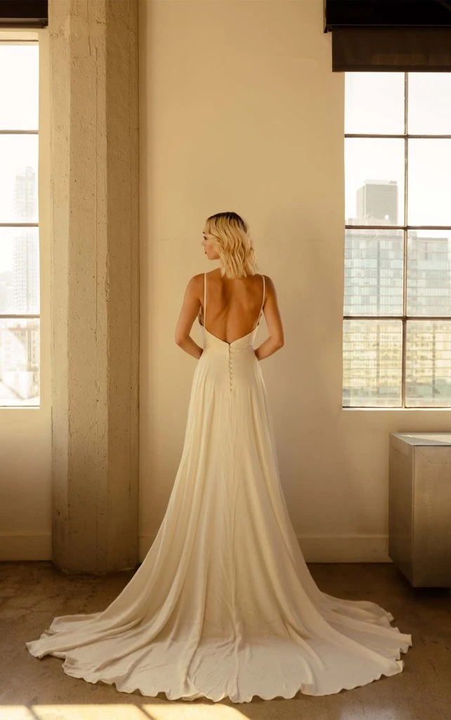 simple silk wedding dress with open back and train - amos by all who wander