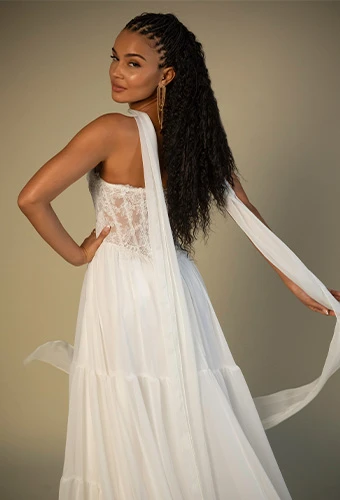 Bride wearing a line wedding dress with lace corset