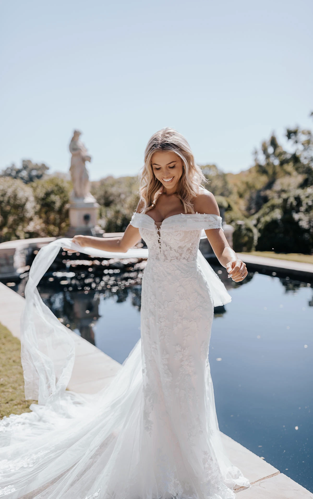 off-the-shoulder mermaid wedding dress with streamers - D3639 by Essense of Australia