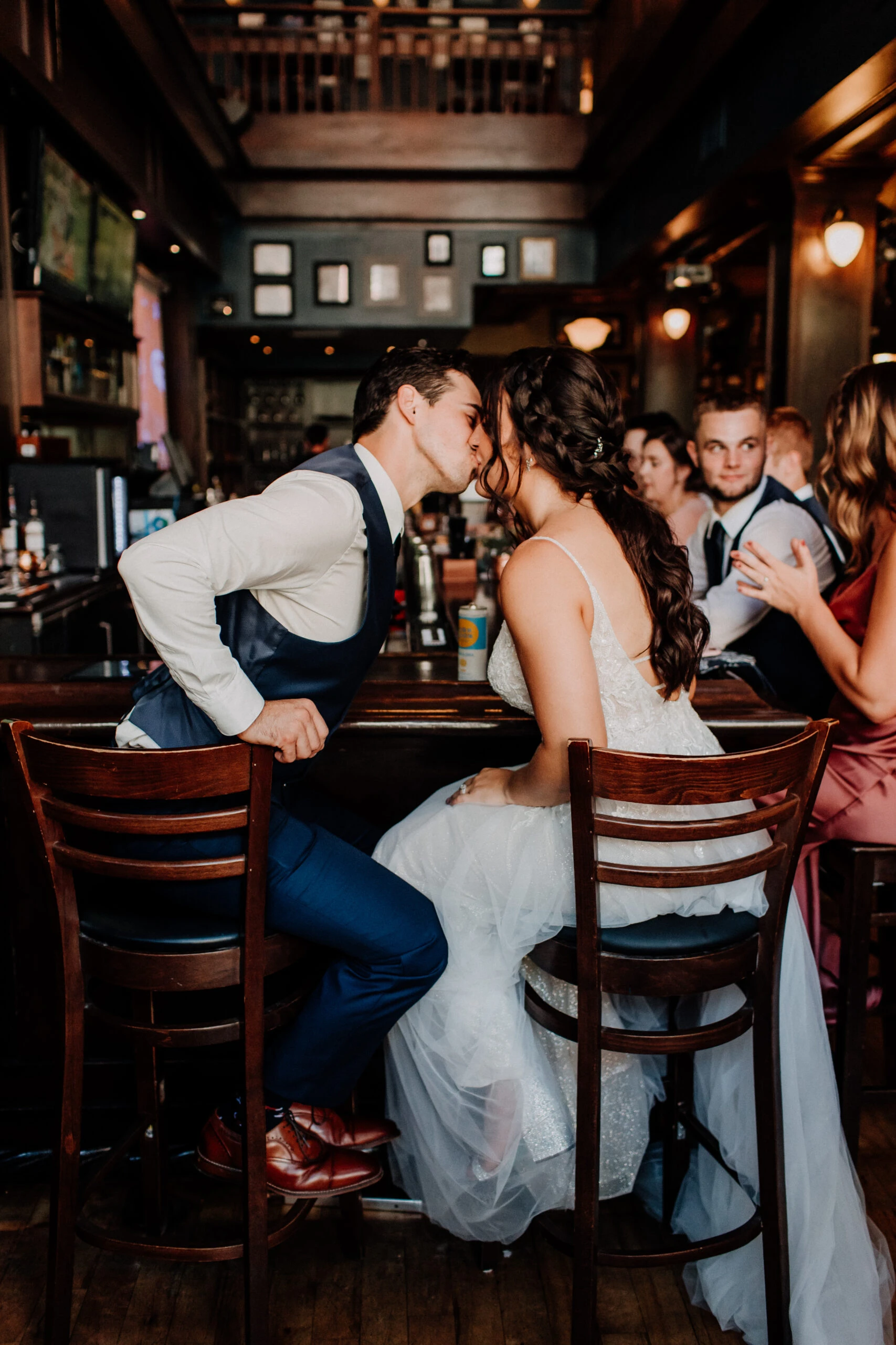 true bride hunter and chandler kiss at bar 