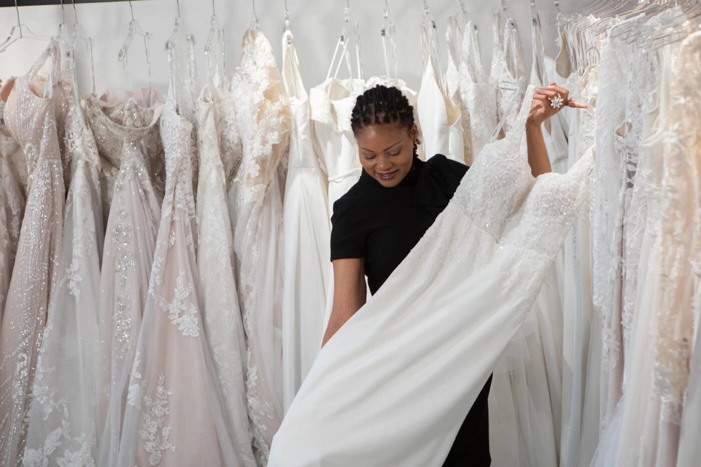 True Society crew member helping find a wedding dress