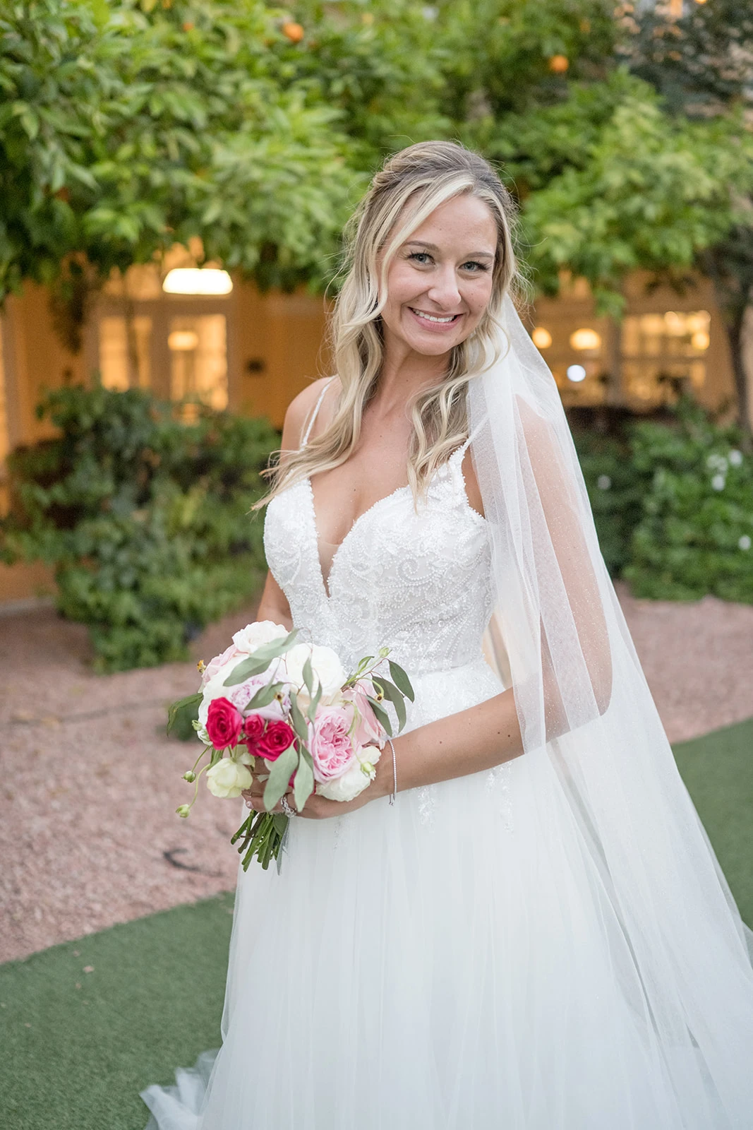 True Bride Amy wearing wedding dress Style York Style 7392 with veil.