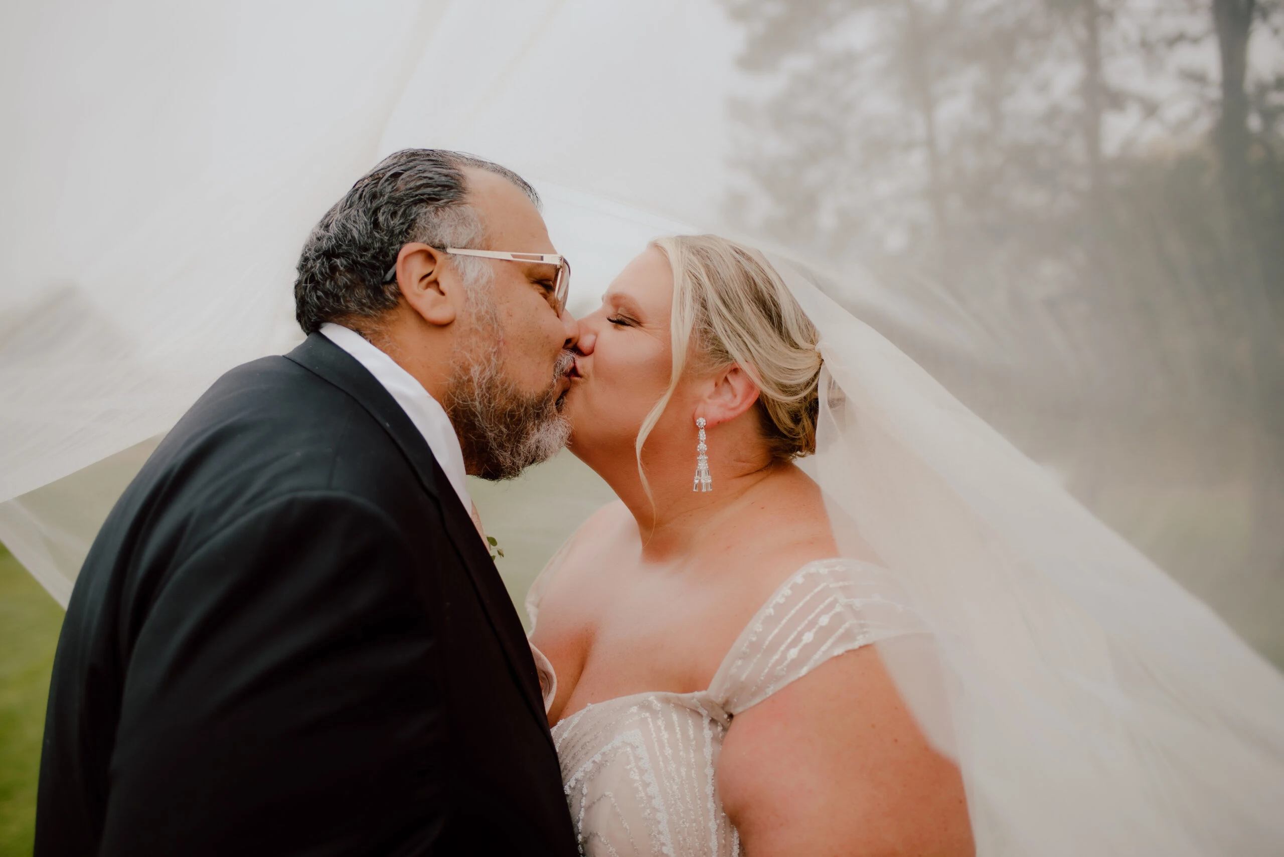 True Bride Meighan and Groom Andres Kissing