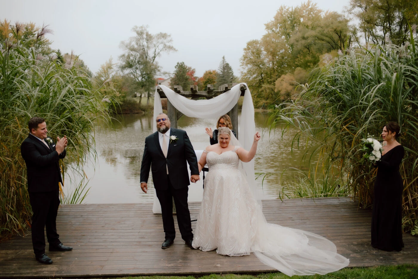 True Bride Meighan and Groom Andres waking down the aisle