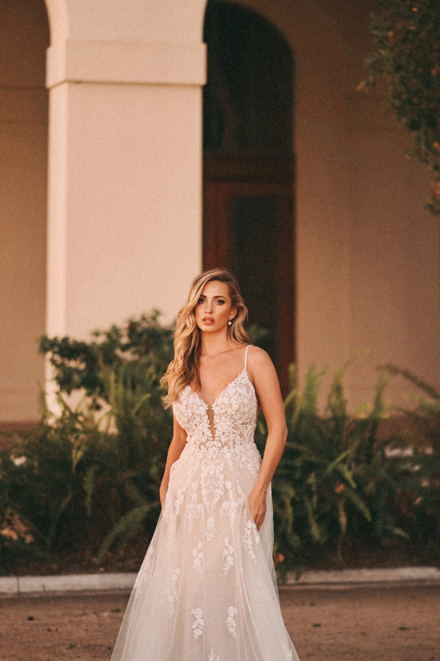 Bride wearing a lace a-line wedding dress 