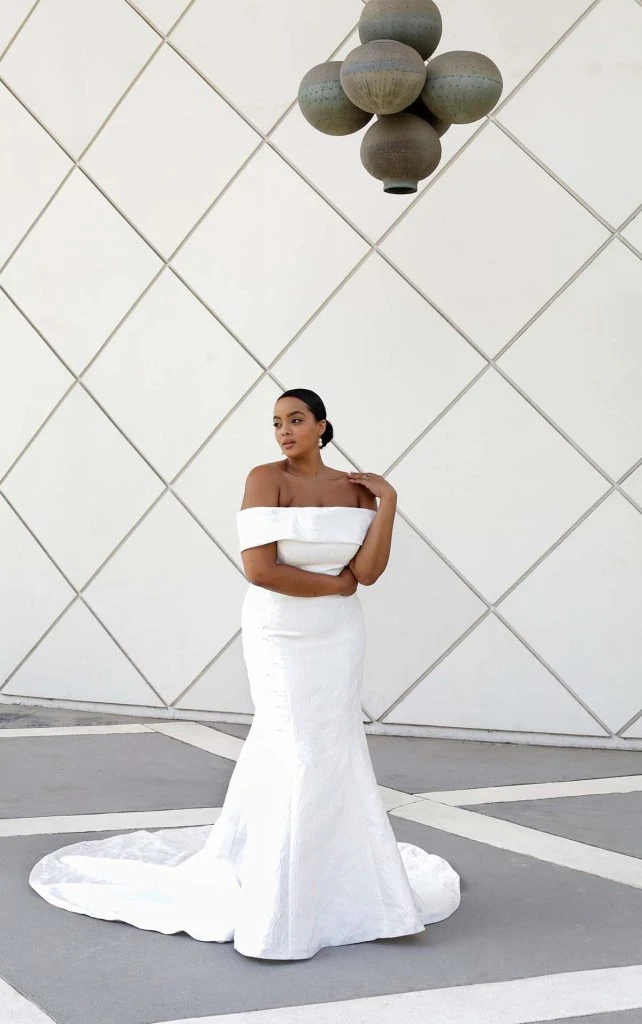 plus size silk fit-and-flare wedding dress with detachable off the shoulder straps and bow - 1619+ by martina liana