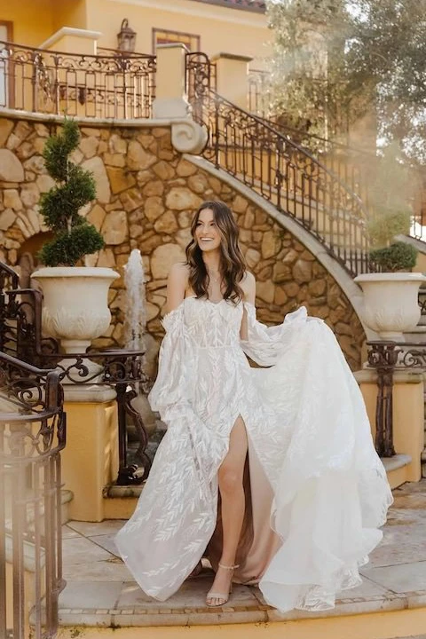 boho a-line wedding dress with flowing skirt and long sleeves - 1633 by Martina Liana