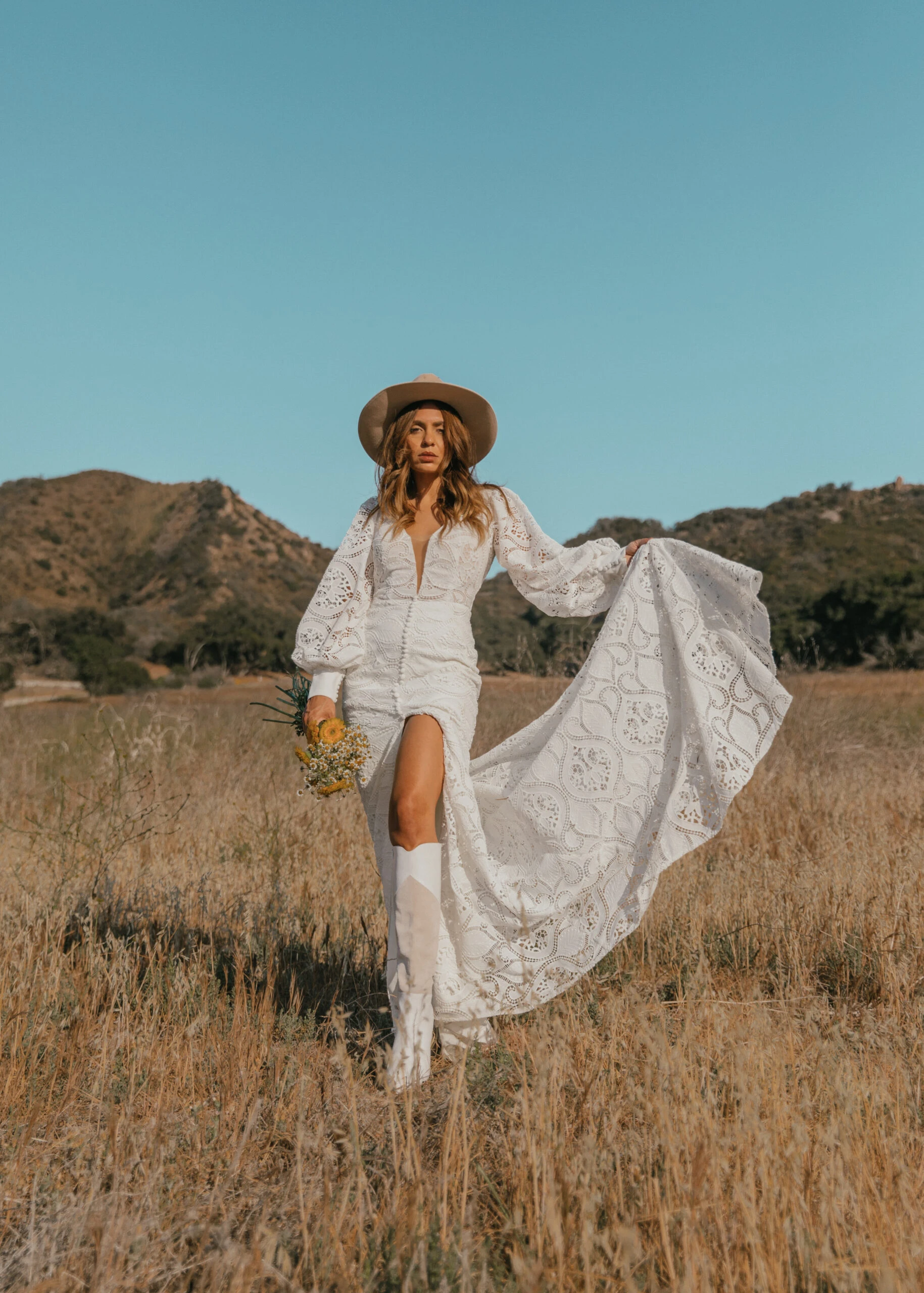 Bride wearing Long Sleeved Lace Wedding Gown