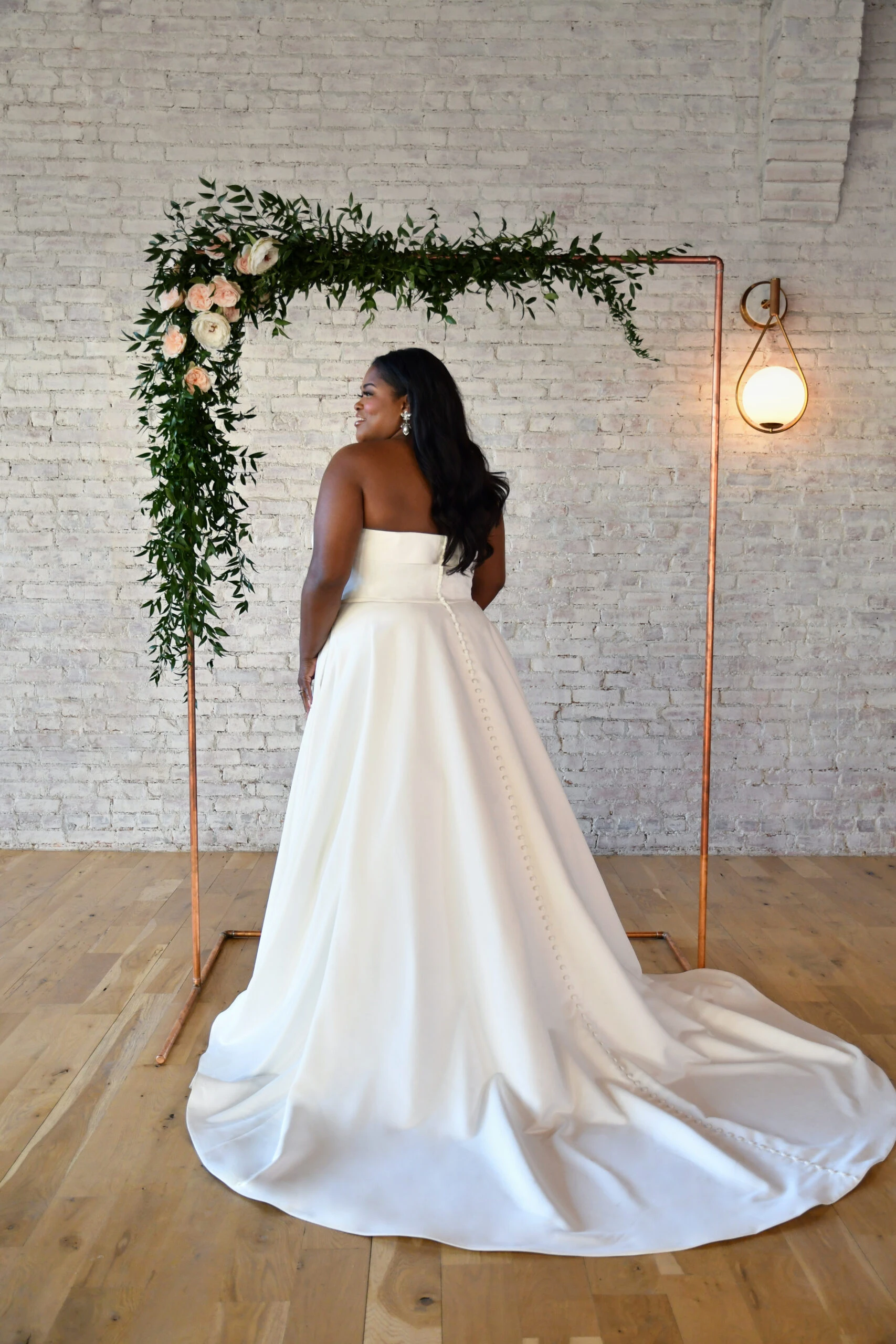 Plus Size Bride wearing Strapless Simple Gown