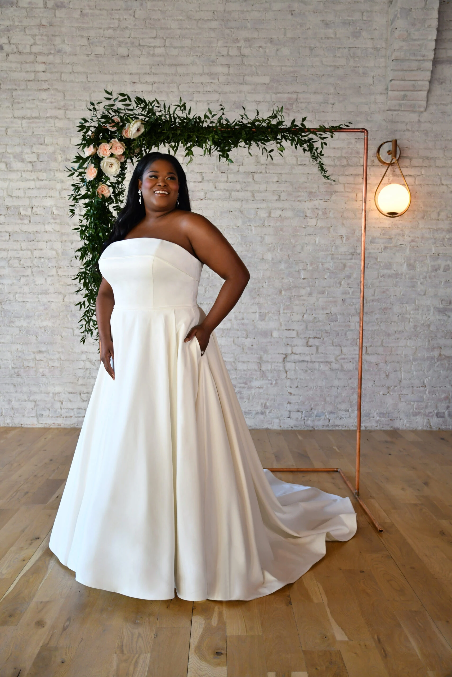 Plus Size Bride wearing Strapless Simple Gown