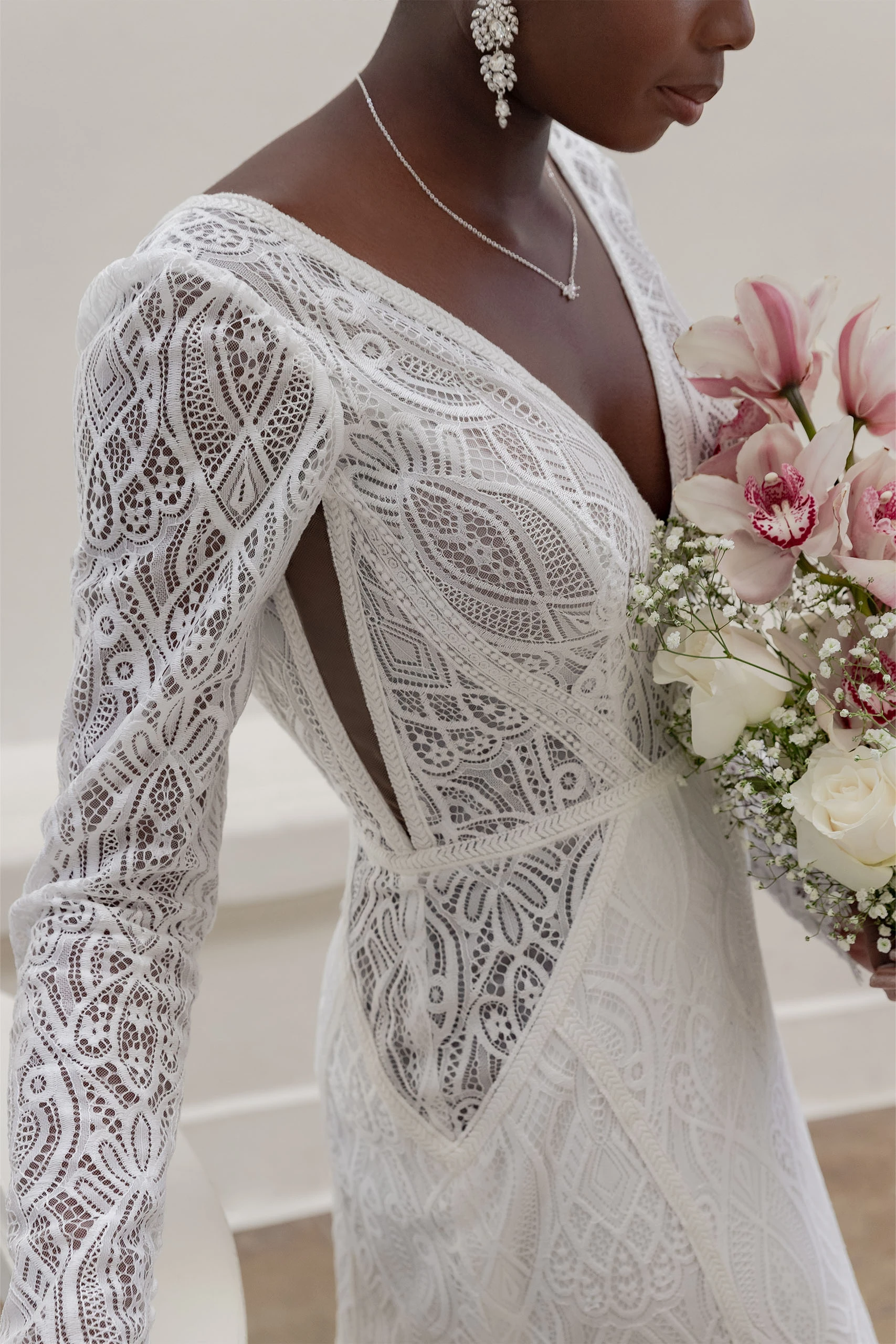 lace sheath wedding dress with cutouts and long sleeves - 7742 by Stella York