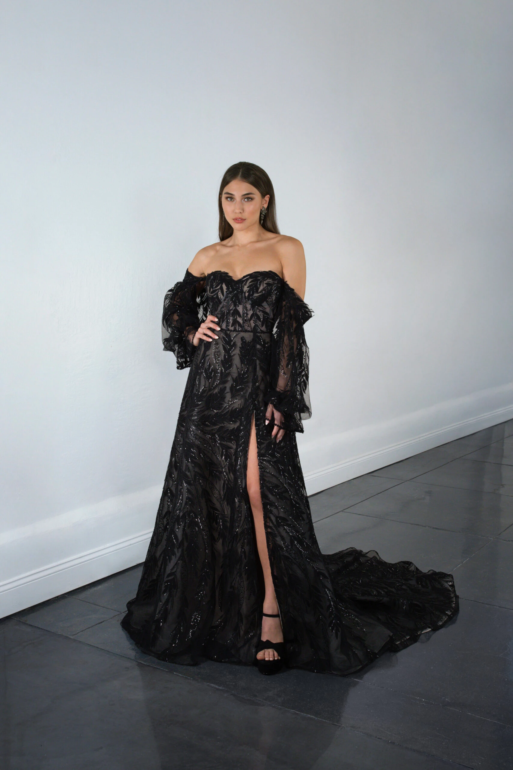 bride wearing off the shoulder lace black wedding gown