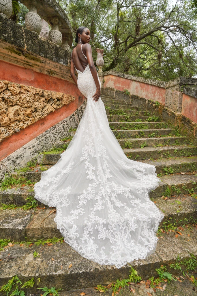Back of Bride wearing a v-neck lace wedding dress