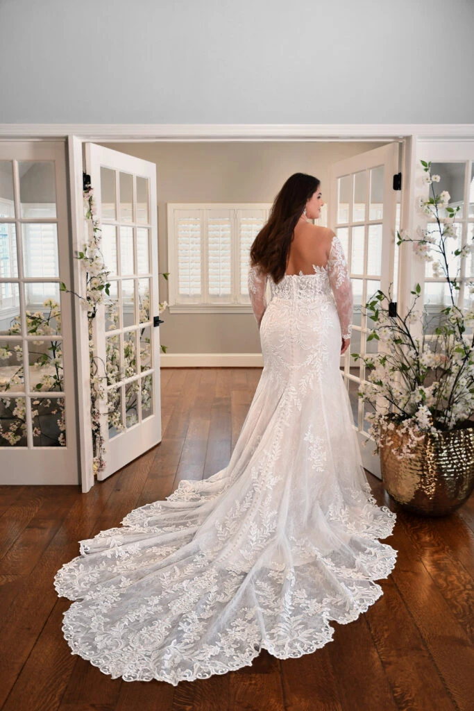 Back of of plus size wedding dress with long off the shoulder sleeves