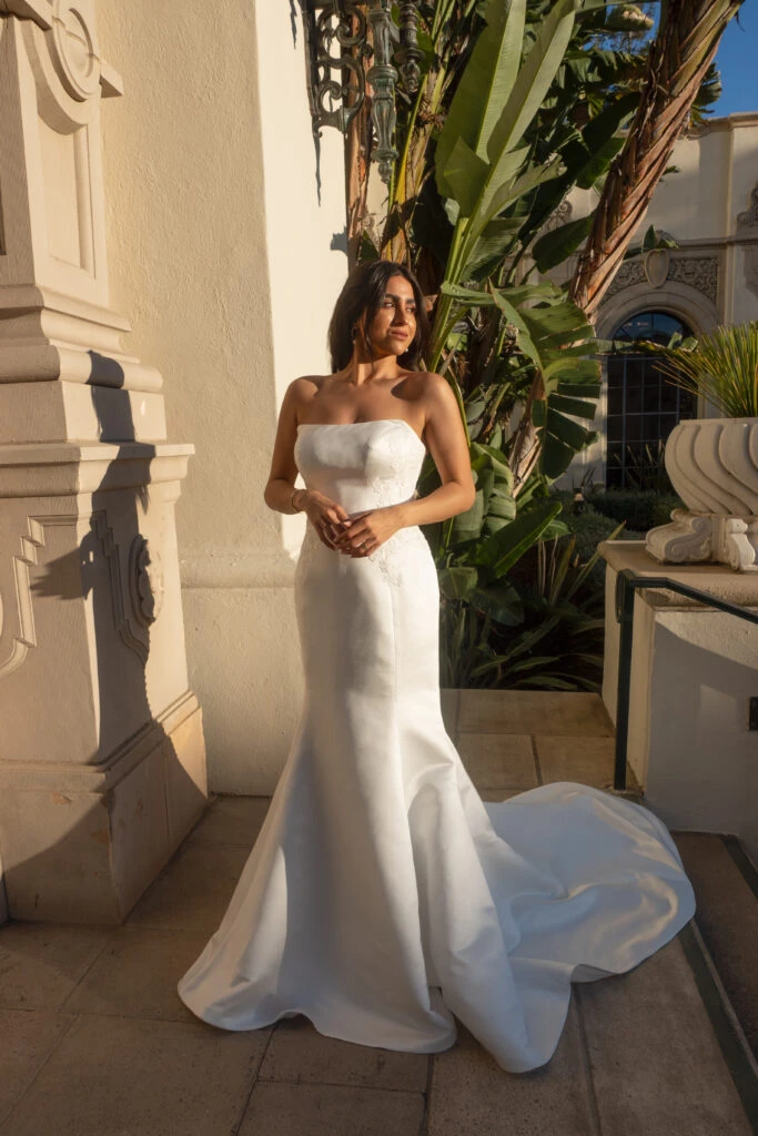 Bride wearing an strapless satin wedding dress