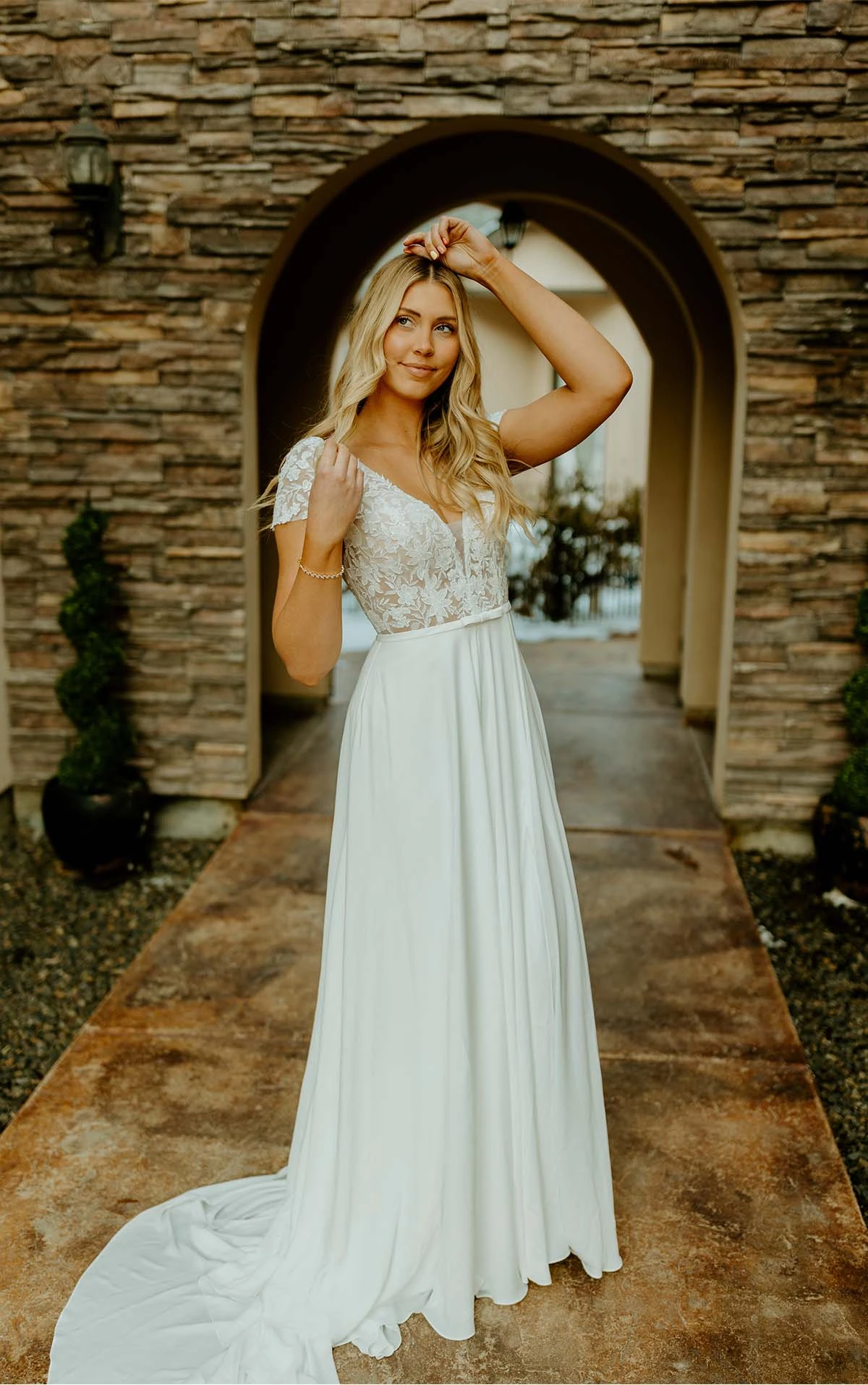 simple soft a-line wedding dress with small bow belt and cap sleeves - 7747 by Stella York