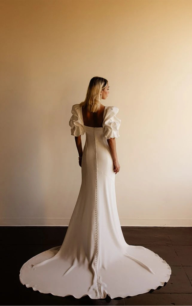 conservative simple wedding dress with square back and short train - eloise by all who wander