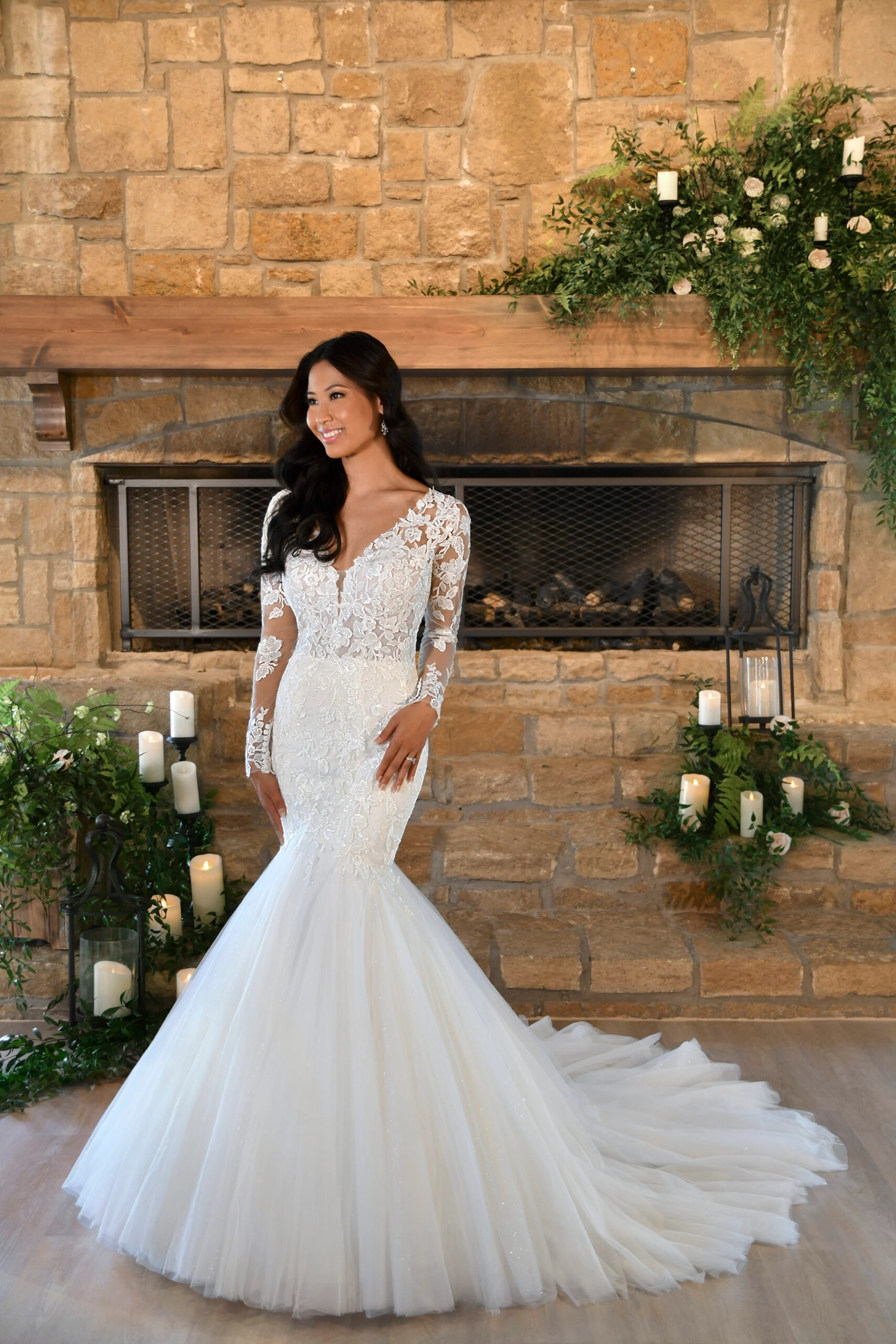 Bride wearing a long sleeve lace wedding dress