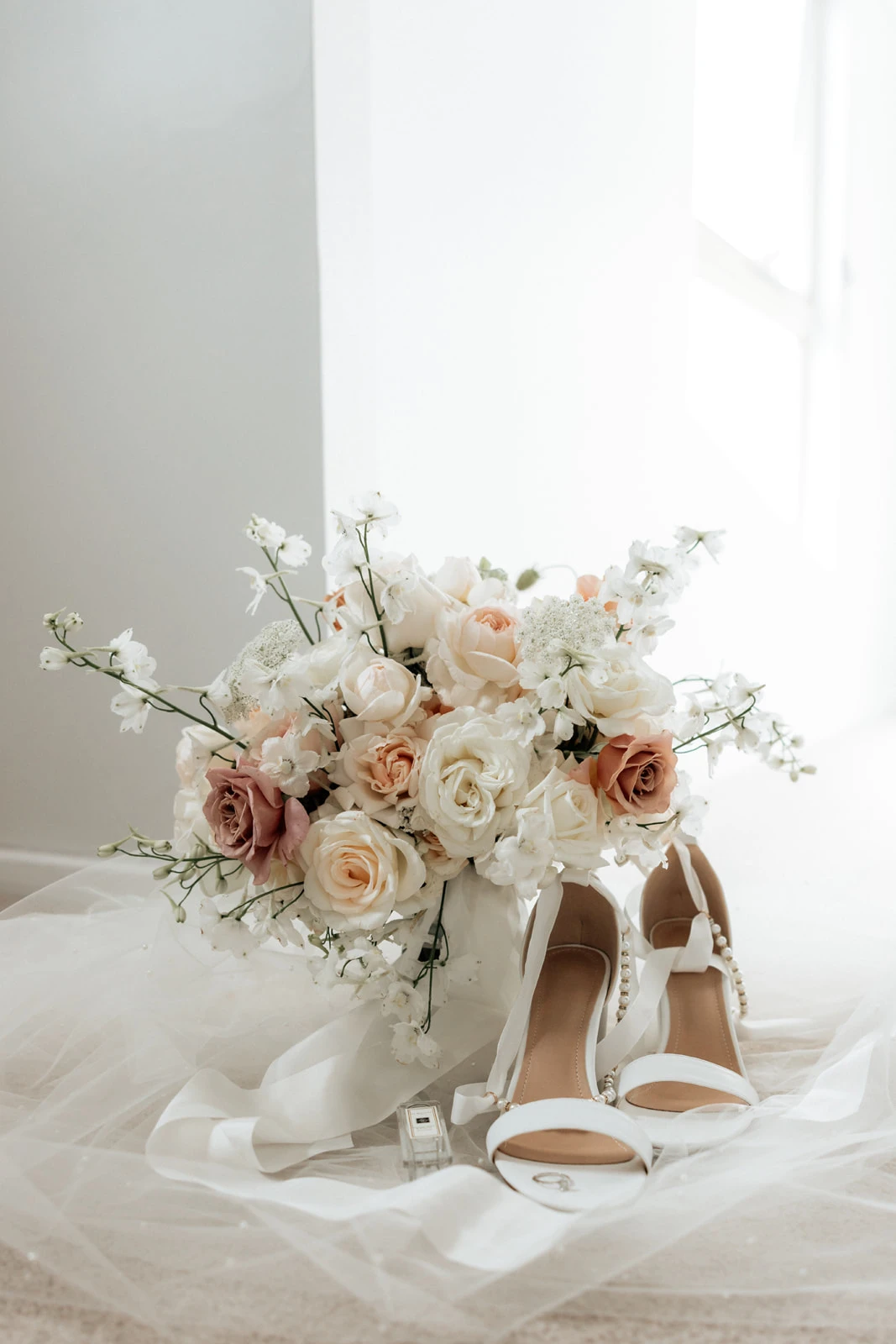 bridal bouquet and shoes 