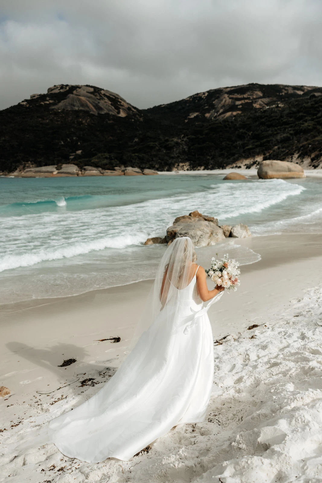 true bride danni on the beach wearing D3460 by Essense of Australia