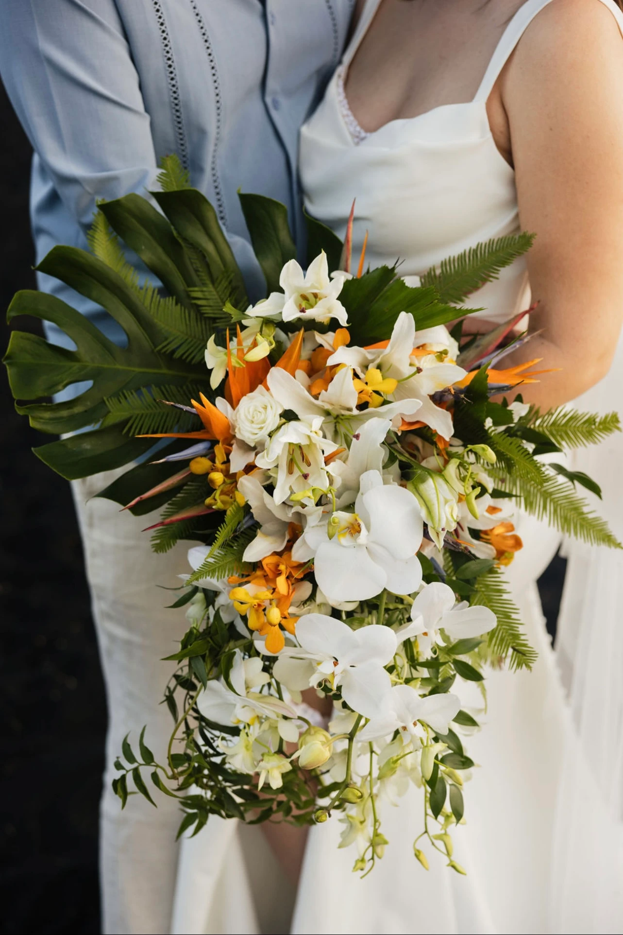 true bride emma holding her bouquet or orchids - D3823 by Essense of Australia