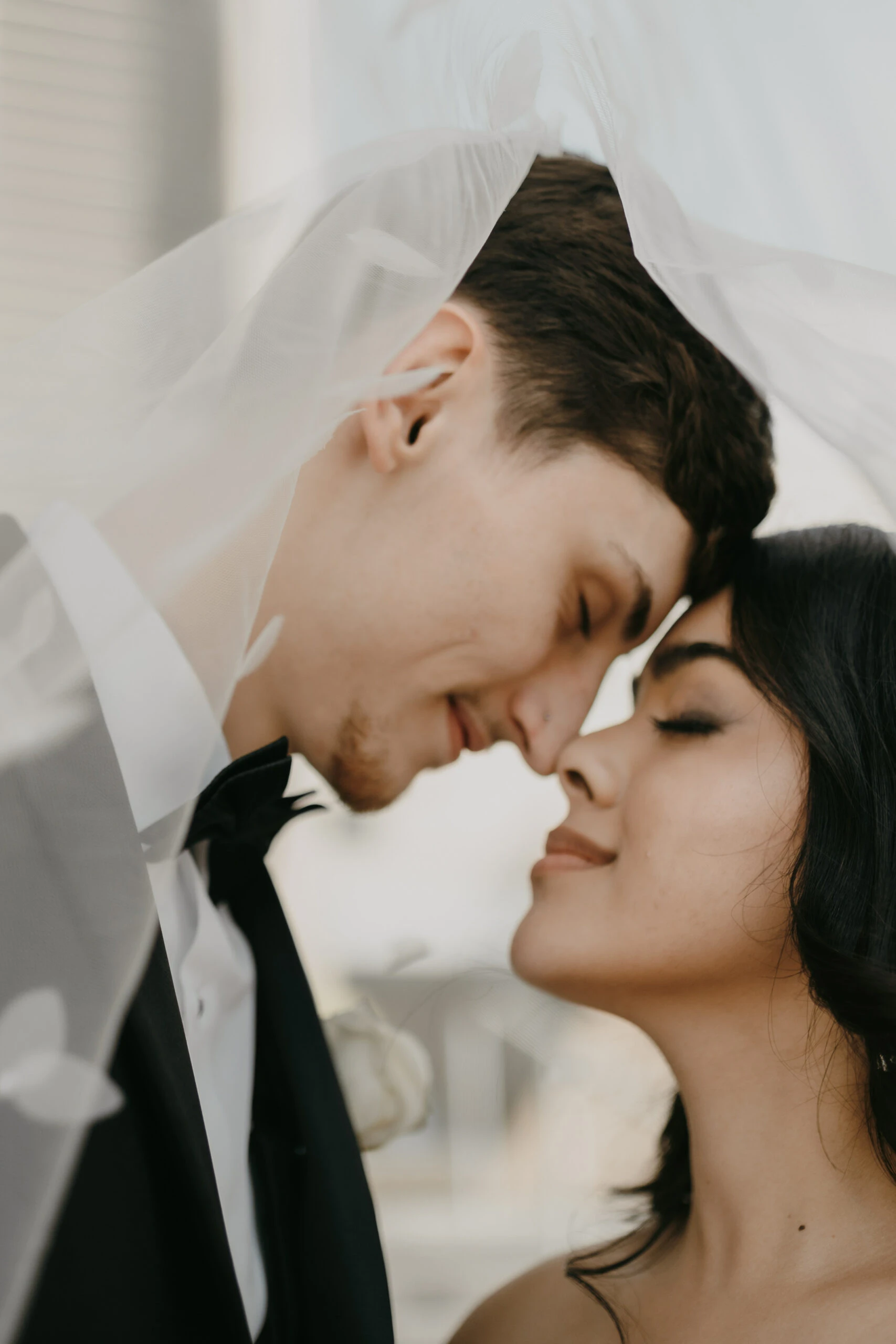 yasmeen and jordan posing nose to nose underneath veil - briar by All Who Wander