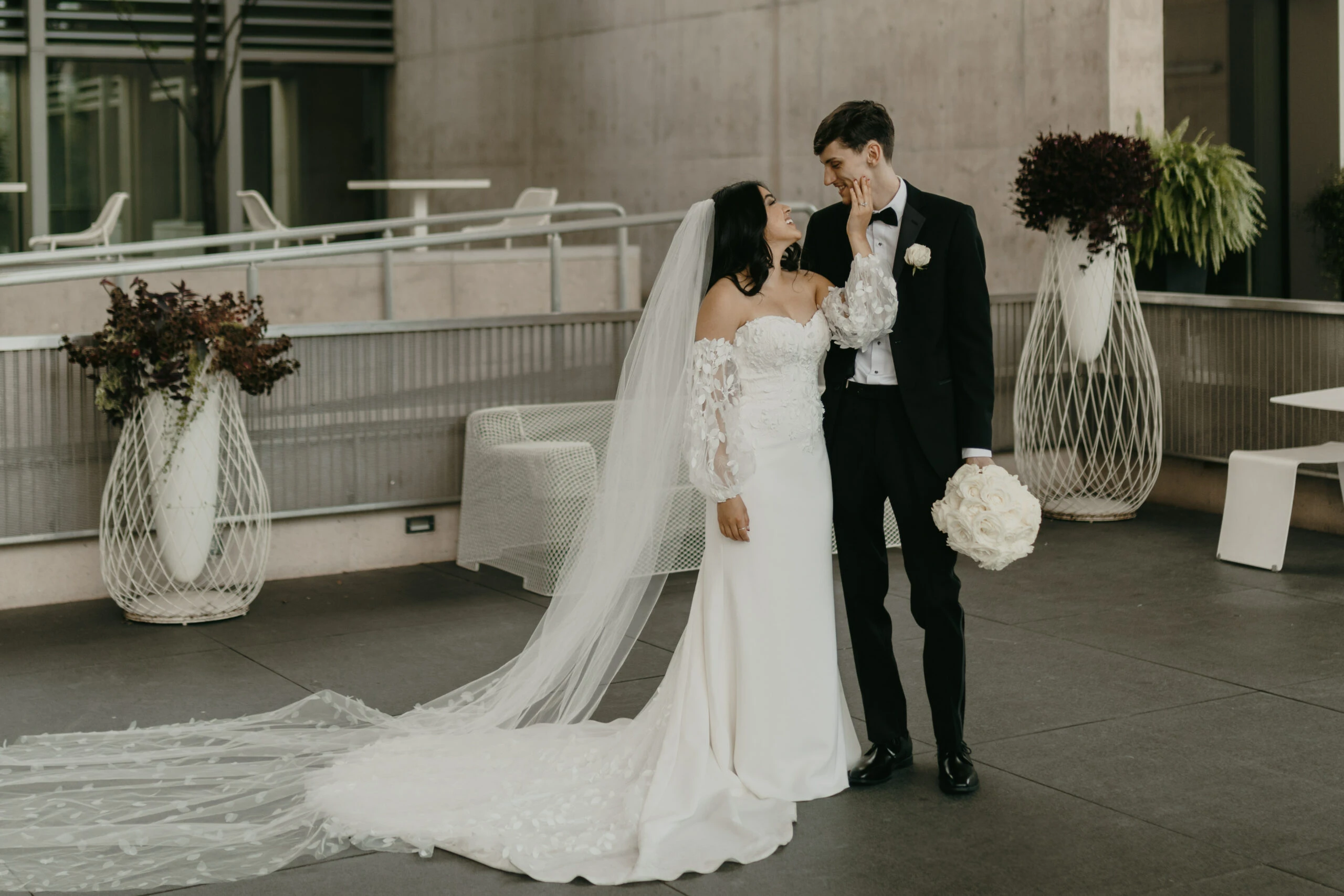 true bride yasmeen and husband jordan smiling at each other - briar by All Who Wander