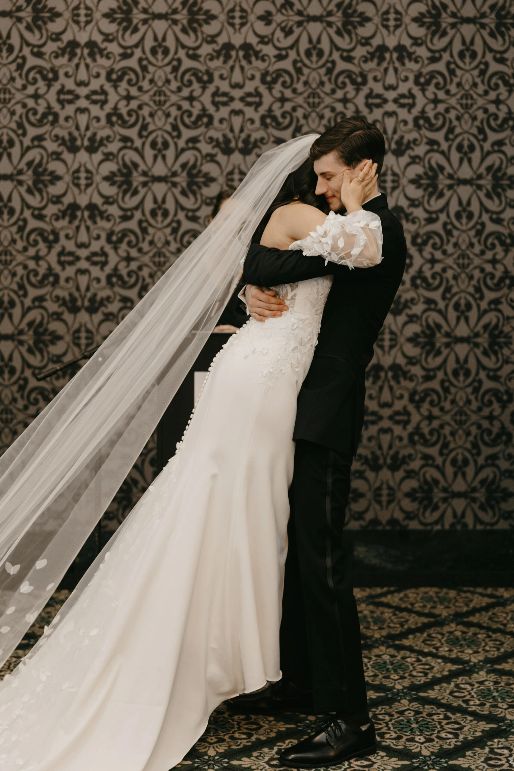 true bride yasmeen and jordan embracing after ceremony - briar by All Who Wander