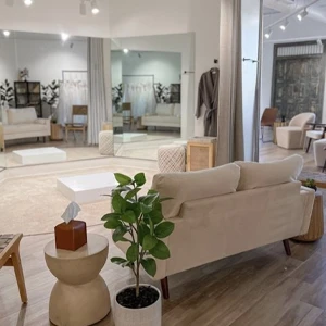 Peoria store interior image of couch and mirrored dressing room