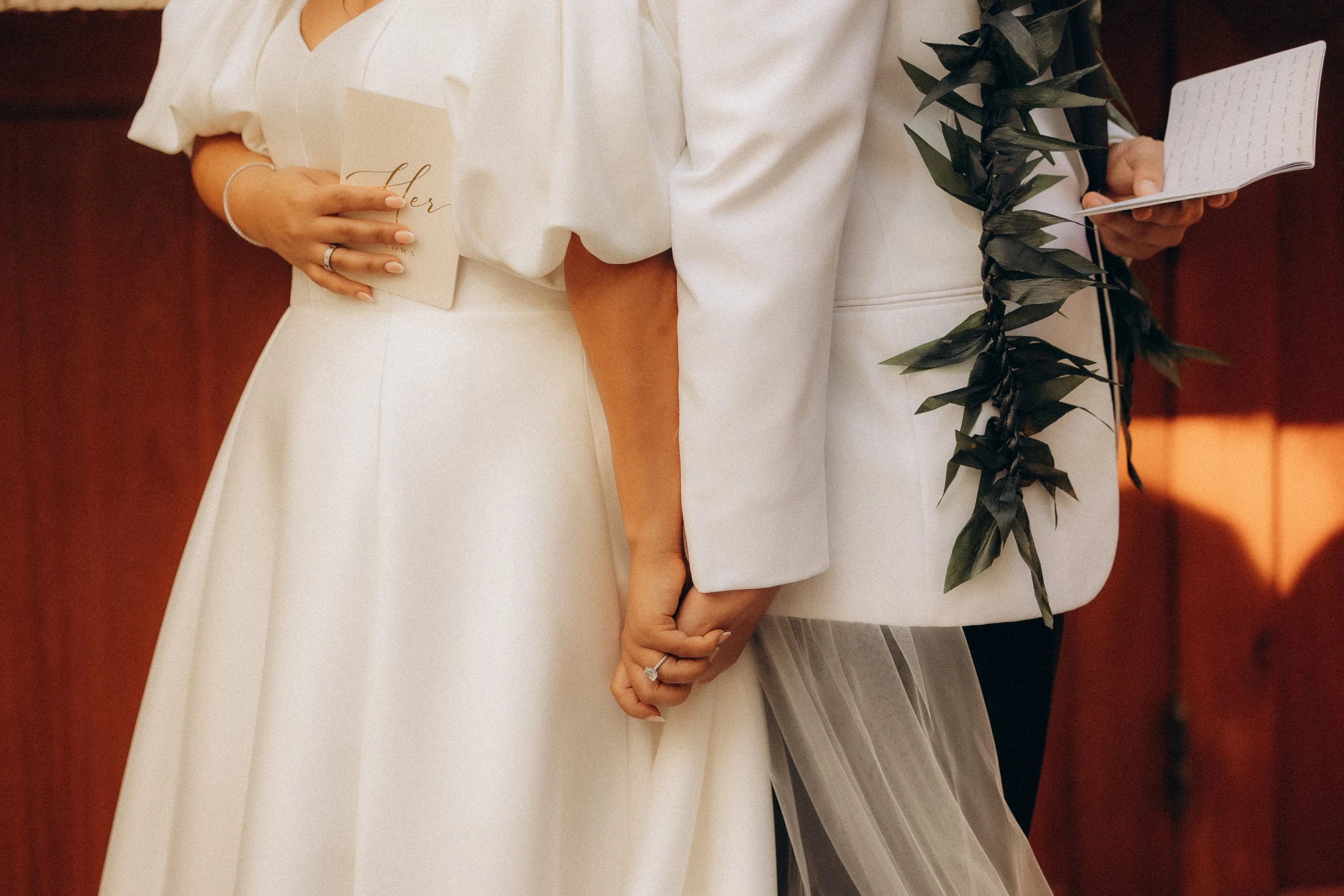 true bride hana and husband brenden holding hands during first touch - 7601 by Stella York